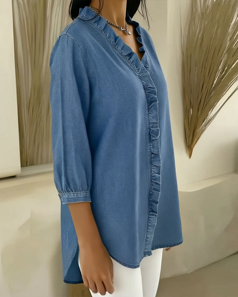 Elvari – Elegant blouse with ruffle details