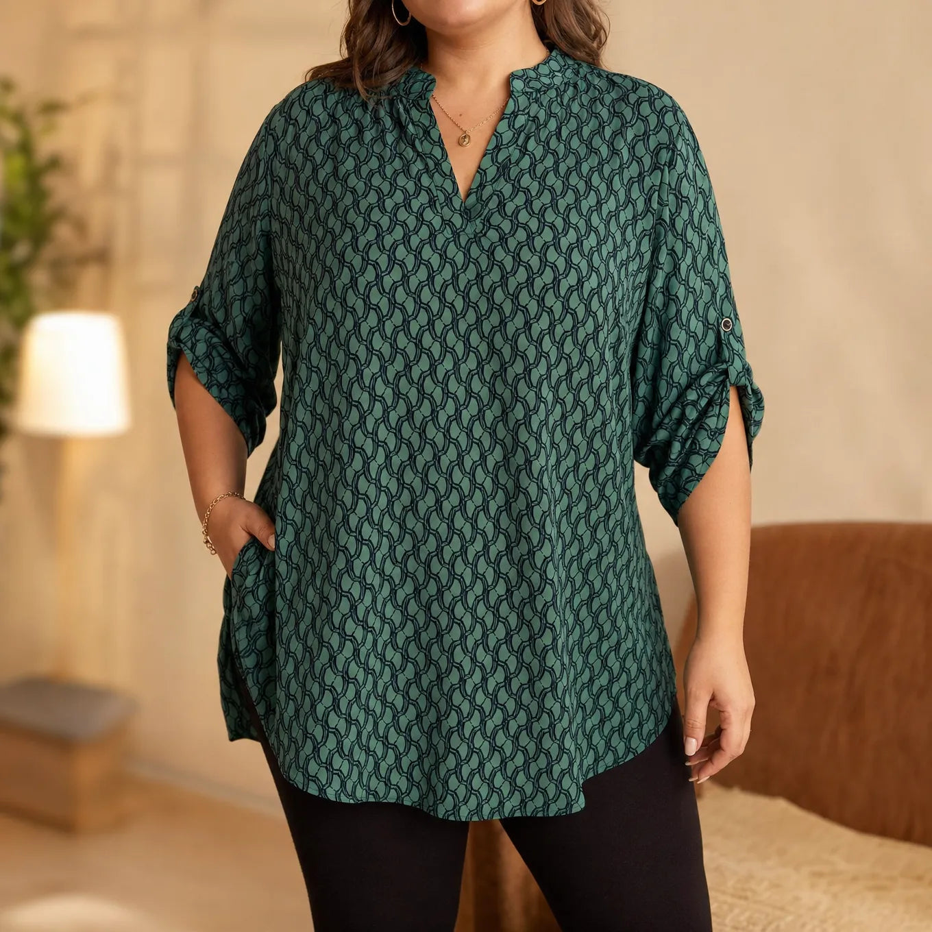 Drapella – Geometric Print V-Neck Tunic Blouse with Roll-Tab Sleeves