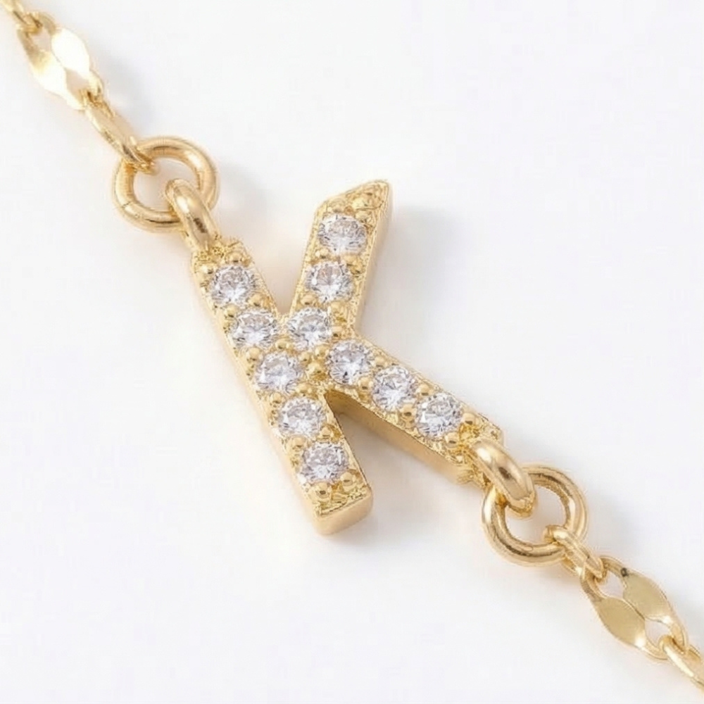 Aurela – Sparkling Initial Cross Necklace