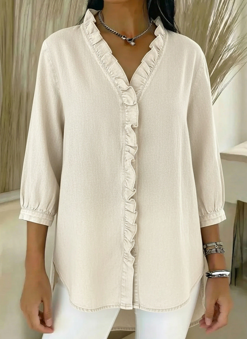 Elvari – Elegant blouse with ruffle details