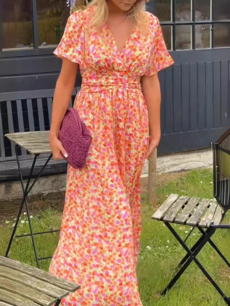 Élina – Long flowy dress with floral patterns