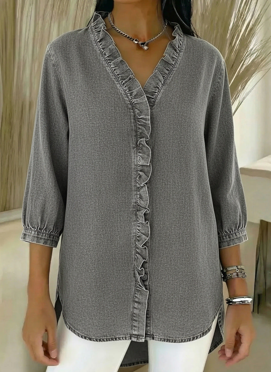 Elvari – Elegant blouse with ruffle details