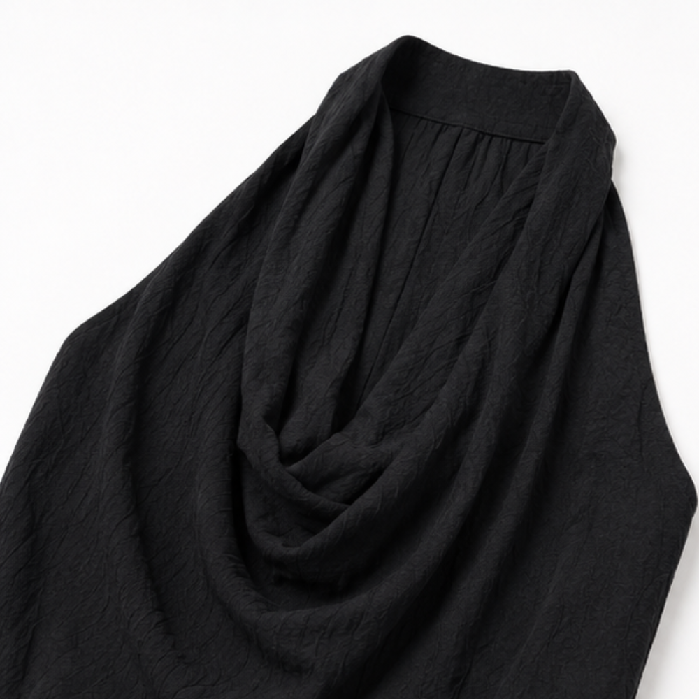 Draplyn – The Halter Jumpsuit That Skims, Not Swallows
