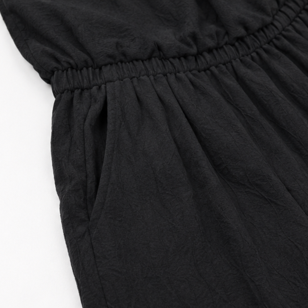 Draplyn – The Halter Jumpsuit That Skims, Not Swallows