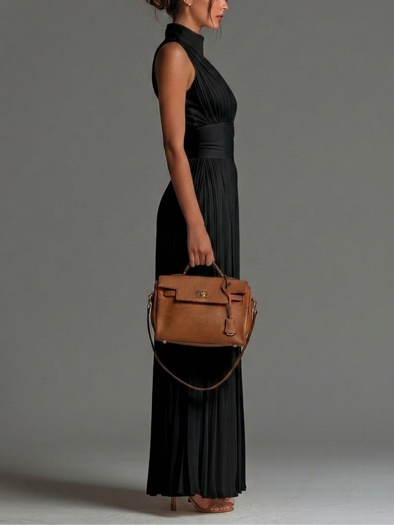 Black sleeveless V-neck jumpsuit with zipper and pleated wide legs in chiffon