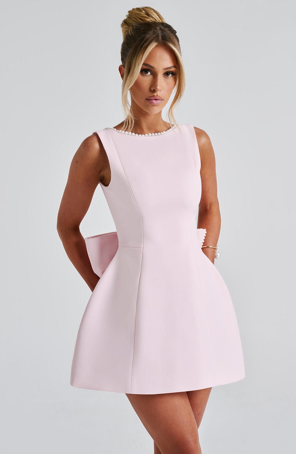 Hollis - Elegant Pearl Bow Mini Dress