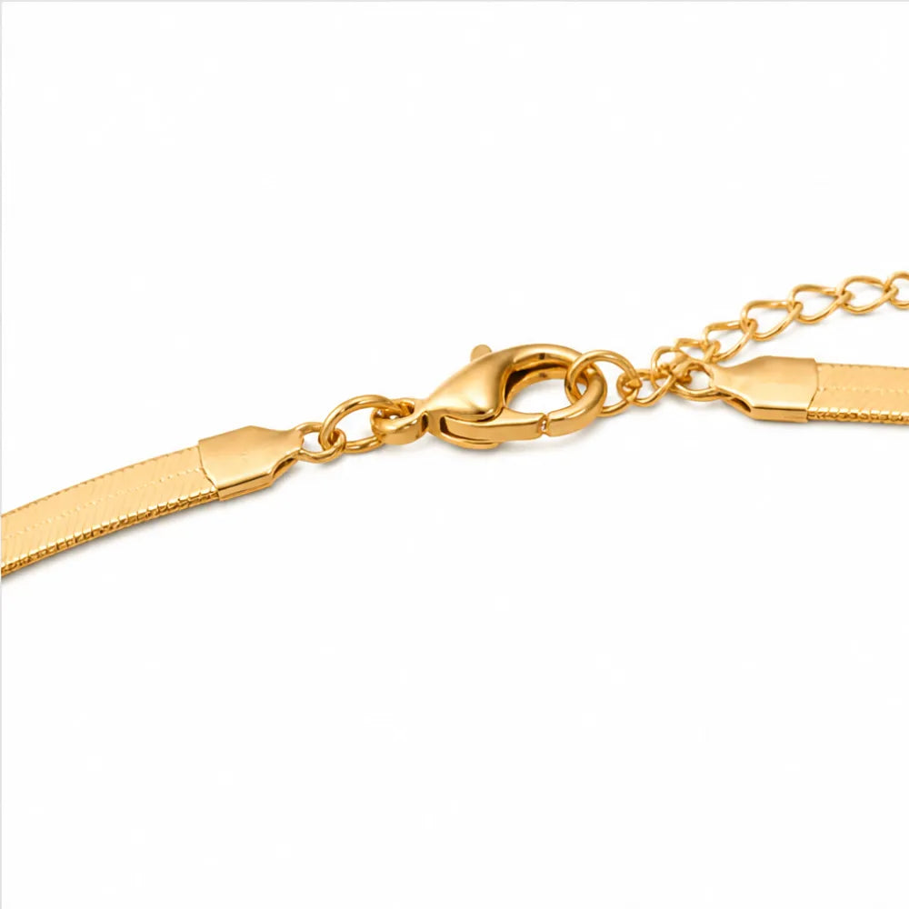 Aurenza – Gold necklace and earring set, textured medallion, flat snake chain