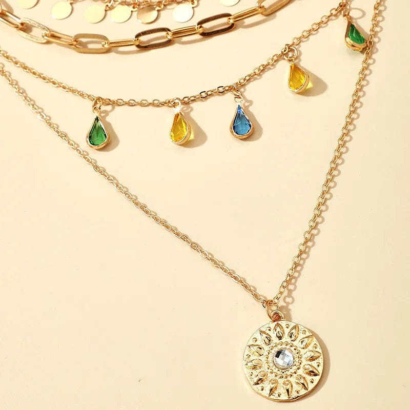 Francesca Necklace – Multi-layered gold with solar medallion