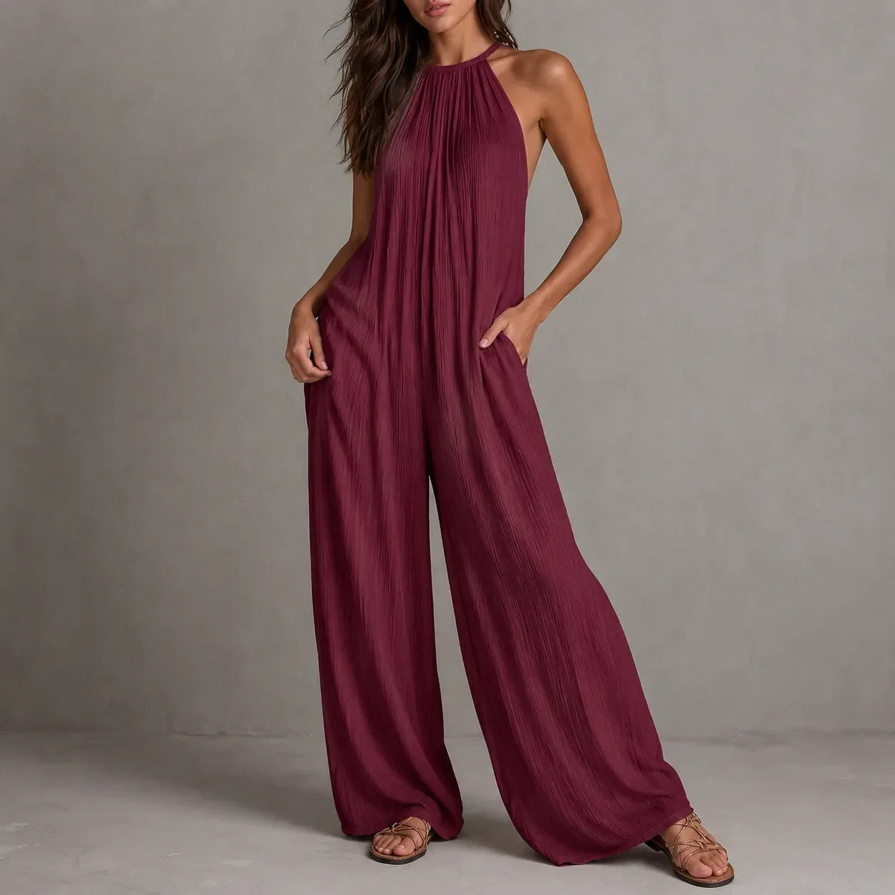 Drevana – Halter Wide-Leg Jumpsuit with Deep Pockets, Flowy Drape