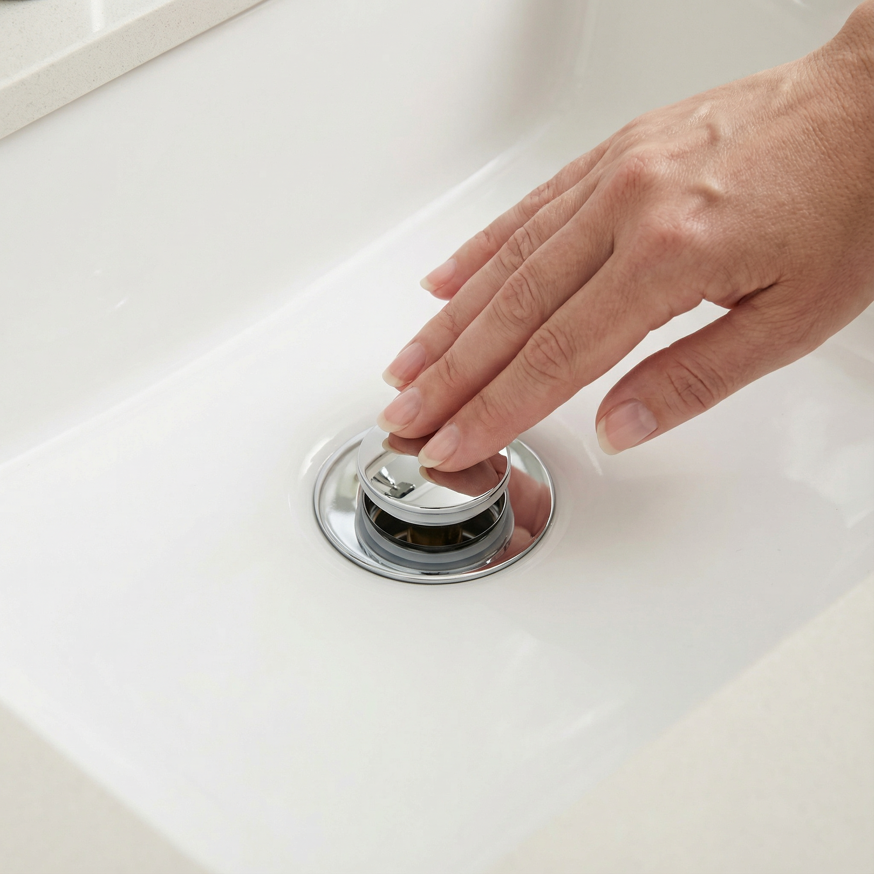 Drainwell - Pop up sink strainer with hair catching basket