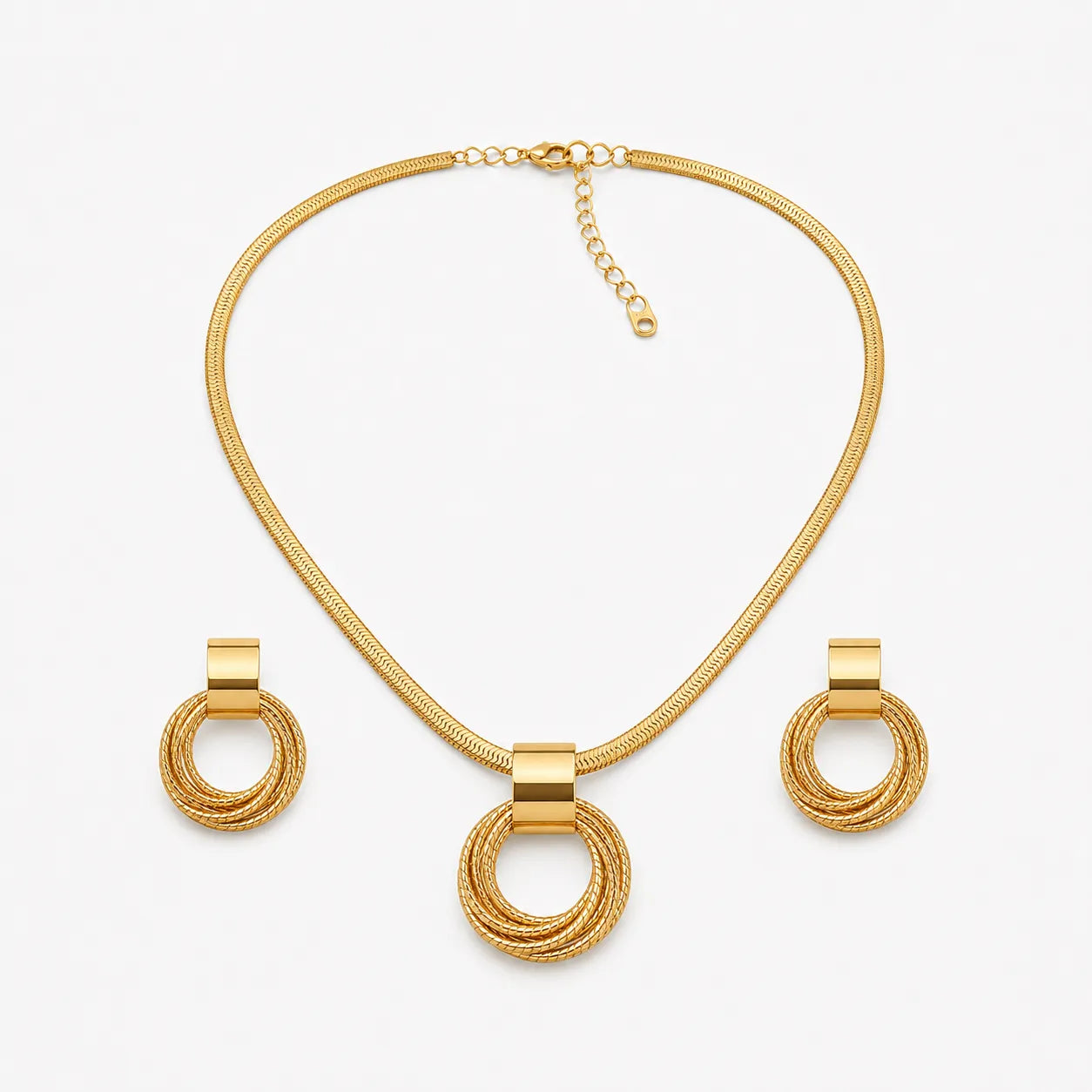 Aurenza – Gold necklace and earring set, textured medallion, flat snake chain